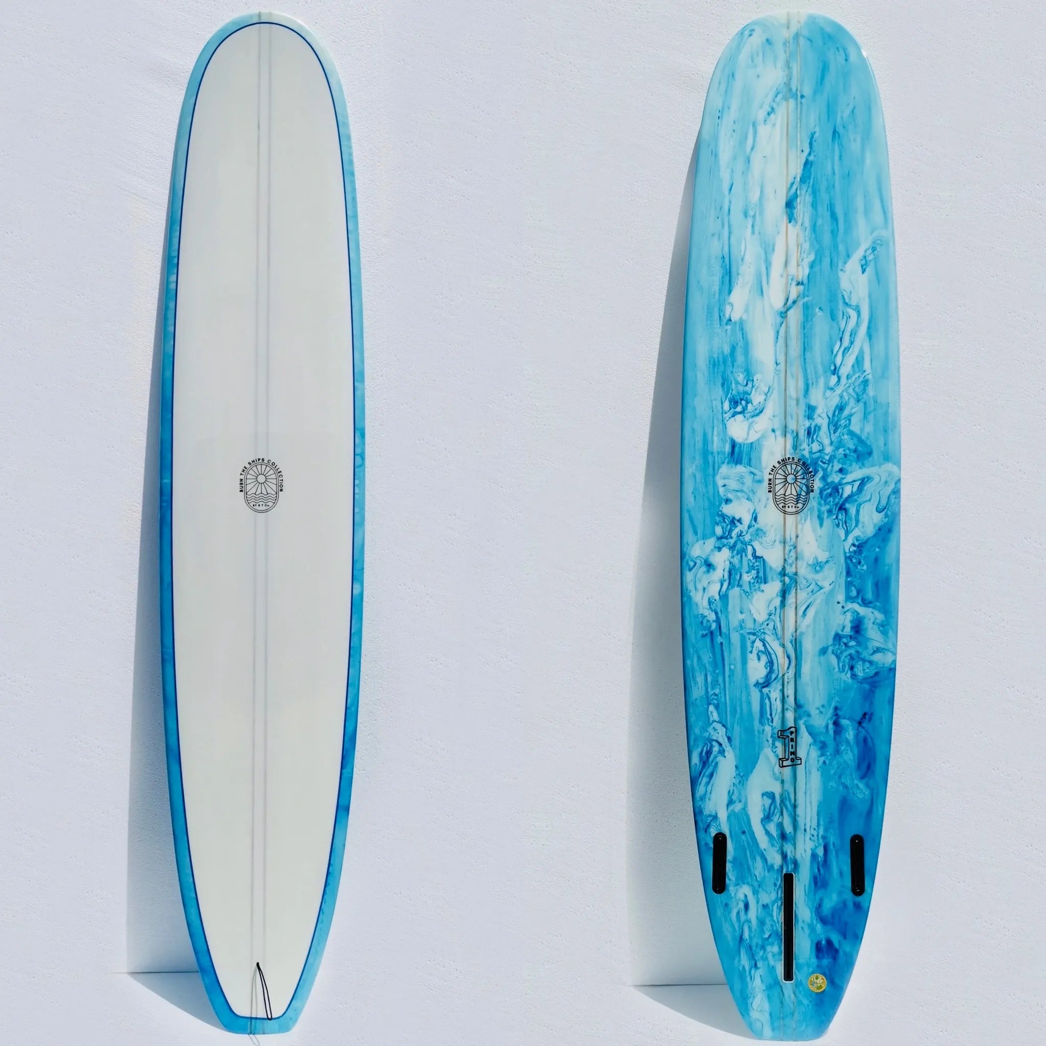 surfboards with enhanced stability for aggressive waves-Surfboard Trading Company Primo Longboard Surfboard - Blue Resin Swirl / Orange Tint